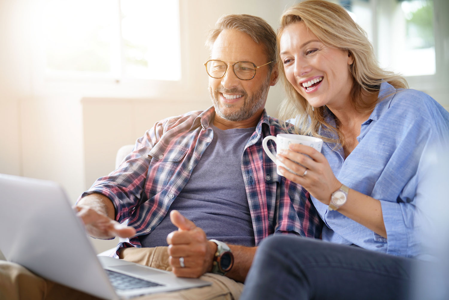 Couple excited for new superannuation insights from a Tax Advisory Service